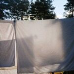 Сіра білизна після пральної машини: чому це відбувається і як цього уникнути