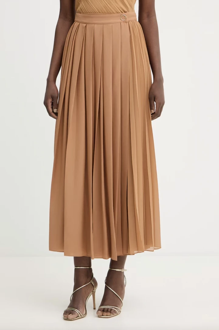 Цієї весни модниці віддають перевагу цій несподіваній спідниці6