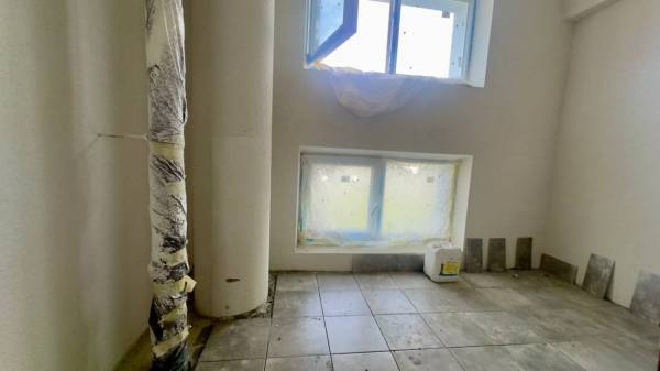 Відновлення вулиці Бучми: харківський будинок знову оживає після обстрілів 10 Відновлення вулиці Бучми: харківський будинок знову оживає після обстрілів 10